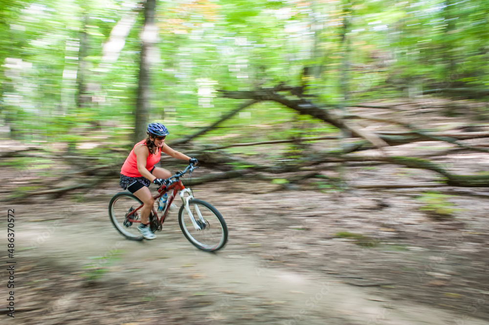 woman mountain biking