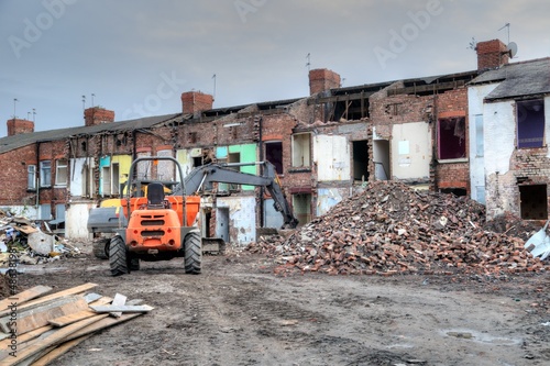 A Row of Houses on a Demolition Site. photo