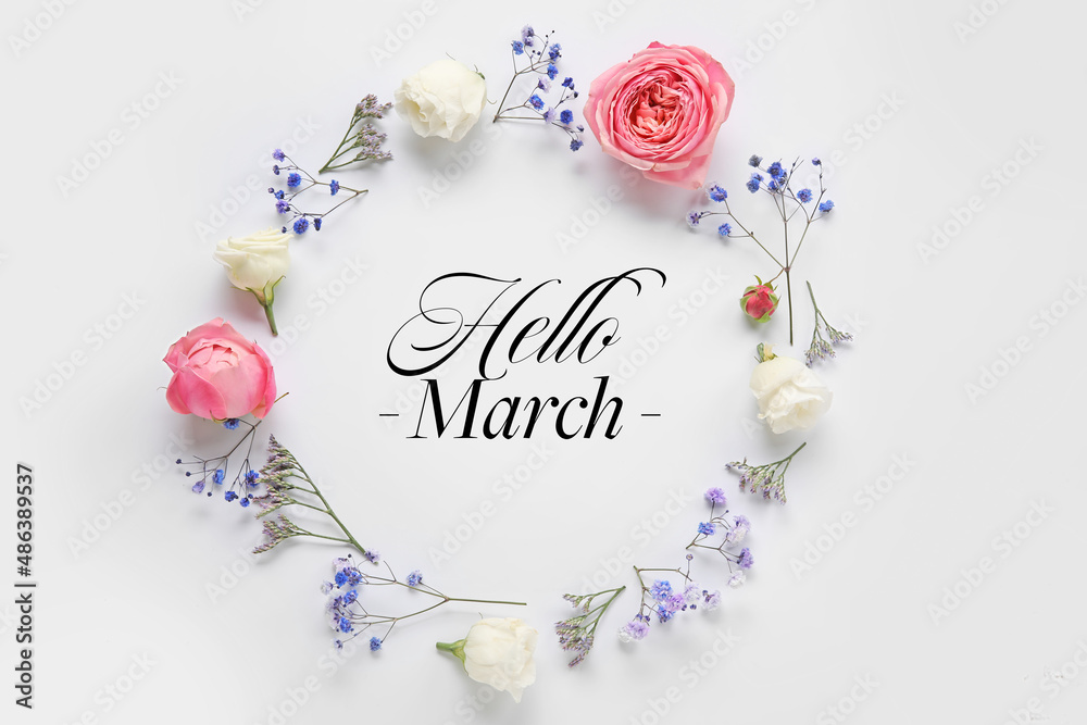 Beautiful flowers with text HELLO MARCH on light background Beautiful flowers with text HELLO MARCH on light background