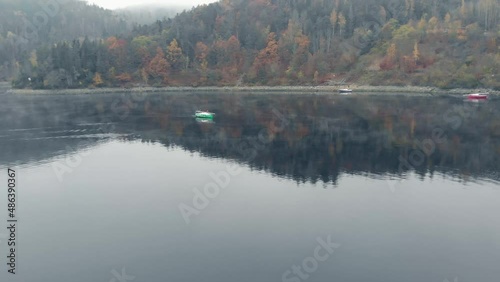 reflection of the autumn mountain in the morning photo