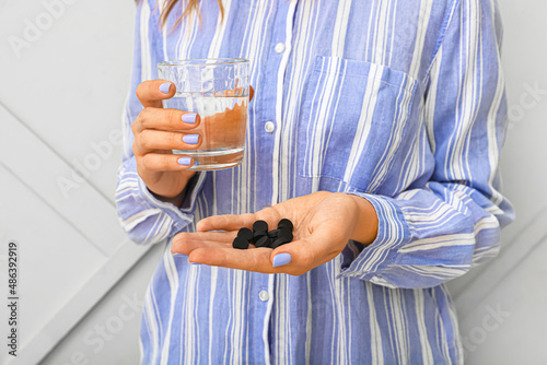 Woman with activated carbon...