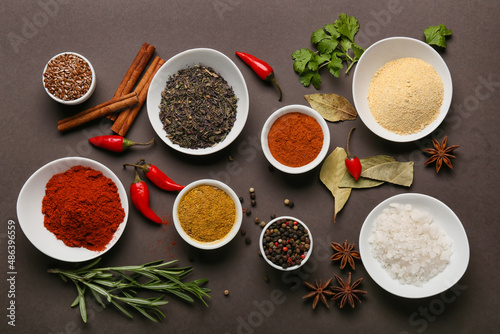 Composition with aromatic spices and herbs on dark background © Pixel-Shot