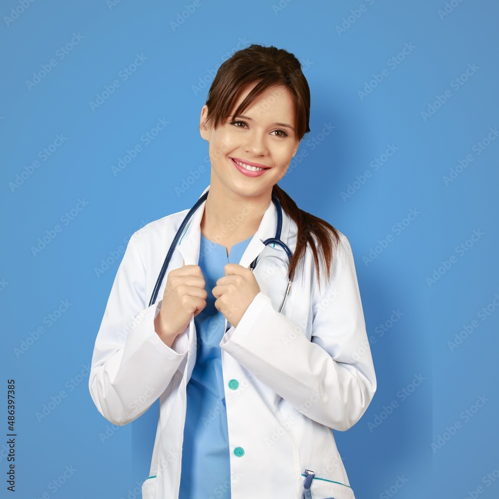 Medical concept of beautiful female doctor in coat with a stethoscope. Medical student. Medical concept of beautiful female doctor in coat with a stethoscope. Medical student.