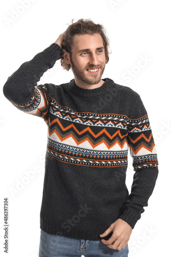 Handsome young man in knitt...