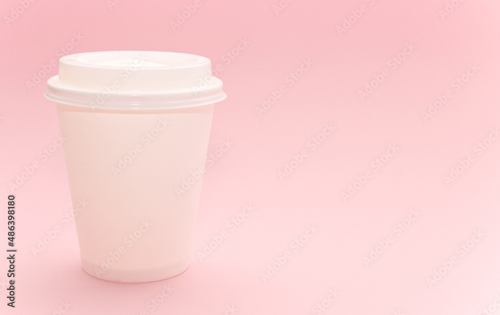 Takeaway papper coffee cup on pink background Takeaway papper coffee cup on pink background