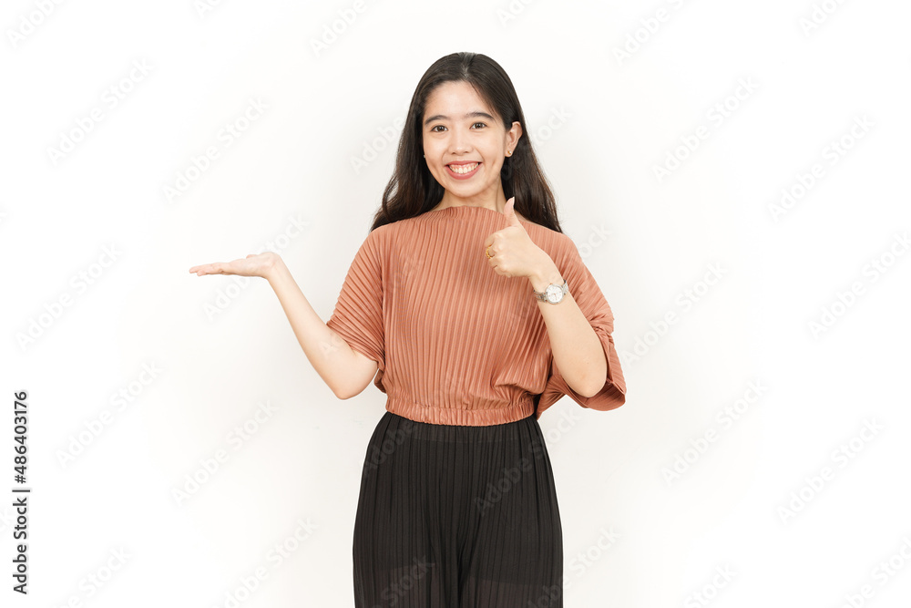 Showing and Presenting Product on Open Palm Of Beautiful Asian Woman Isolated On White Background Showing and Presenting Product on Open Palm Of Beautiful Asian Woman Isolated On White Background