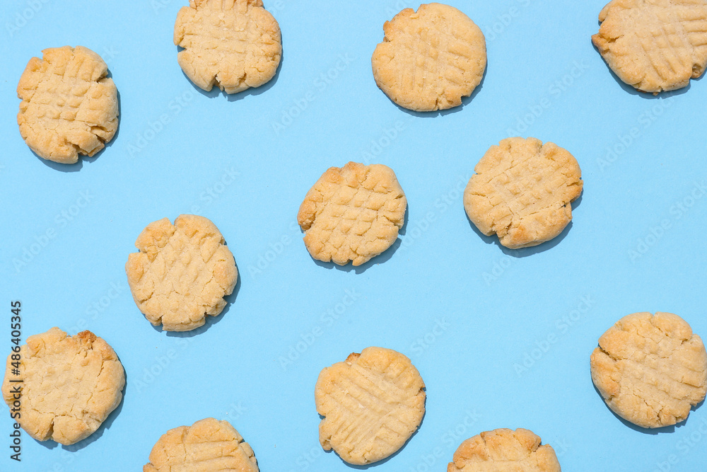 Tasty peanut cookies on blue background Tasty peanut cookies on blue background