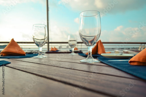 View of goblets on table, in an outdoor restaurant.