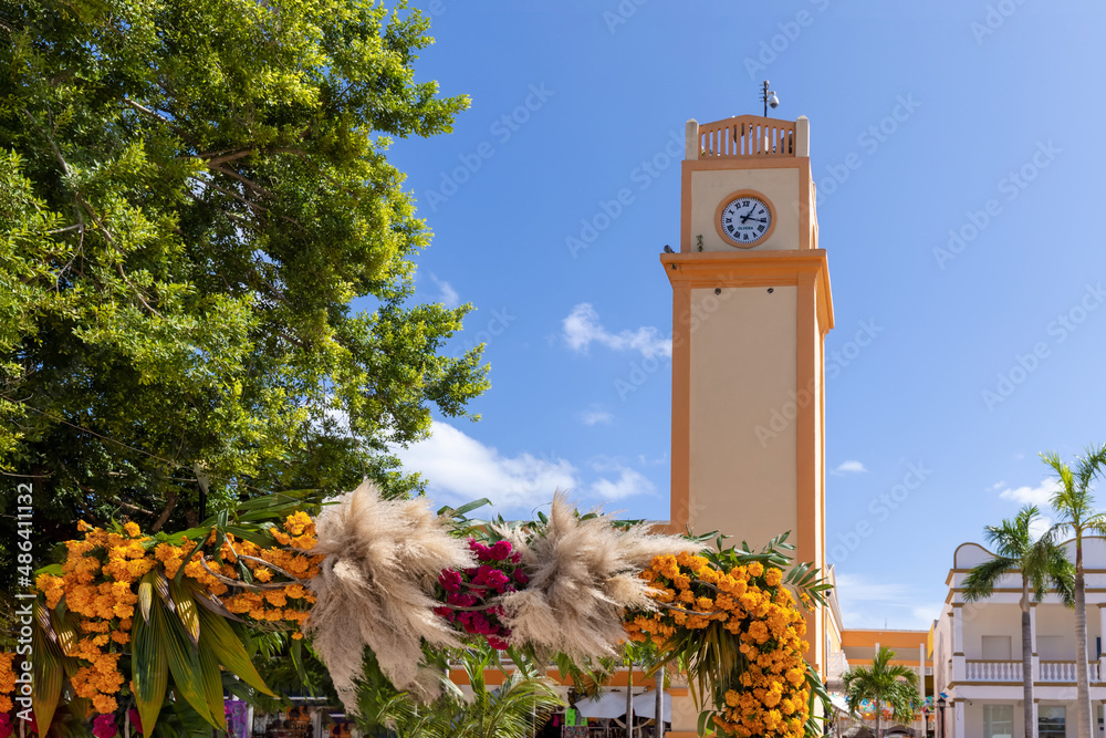 Fototapeta premium San Miguel de Cozumel, Mexico, Central Plaza and colorful colonial city downtown streets during peak months of high tourist season.