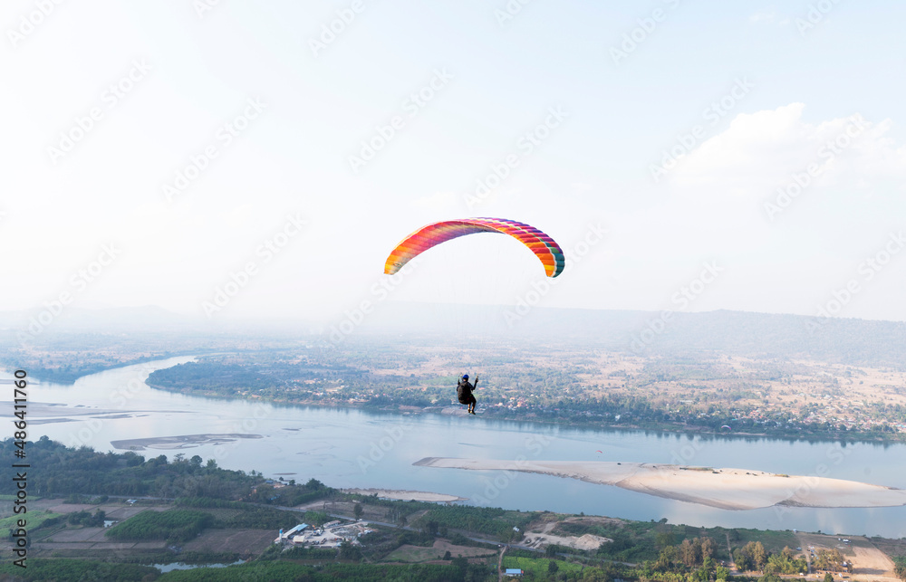Paragliding with a trainer over the Mekong River Thailand Paragliding Extreme Sports Paragliding with a trainer over the Mekong River Thailand Paragliding Extreme Sports