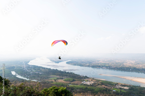 Paragliding with a trainer over the Mekong River Thailand Paragliding Extreme Sports