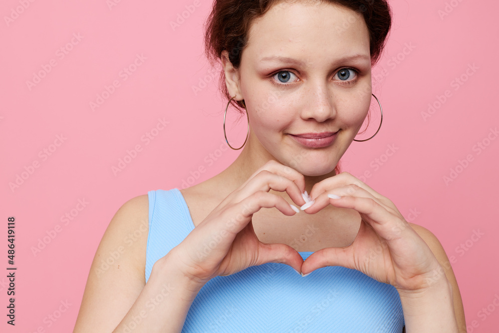 beautiful woman grimace close-up emotions earrings posing isolated backgrounds unaltered beautiful woman grimace close-up emotions earrings posing isolated backgrounds unaltered