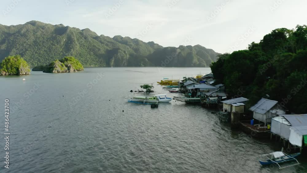 Aerial Over Moored Banca Boats At Coron Islands In Philippines. Dolly Forward Aerial Over Moored Banca Boats At Coron Islands In Philippines. Dolly Forward