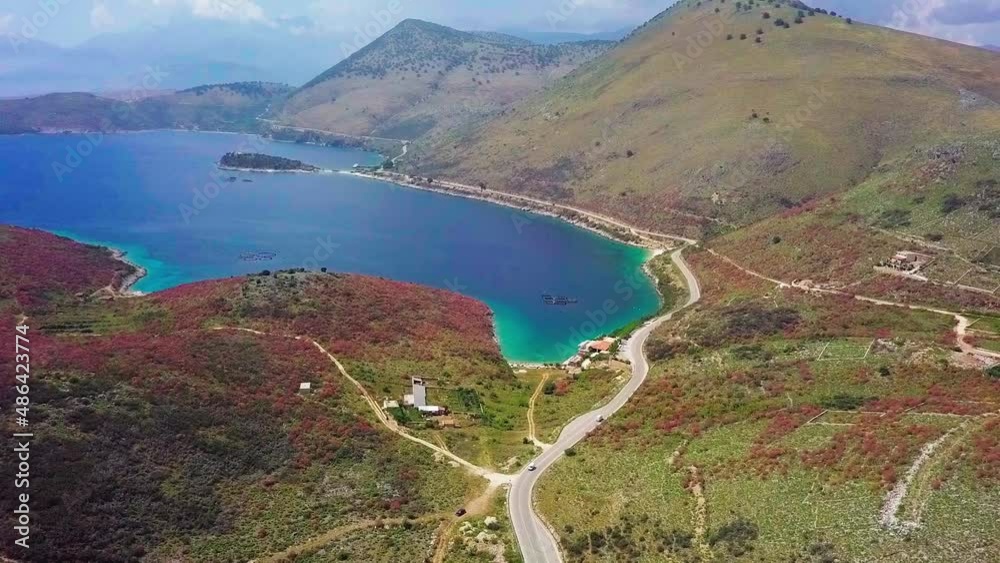 The stunning coastline and landscapes of Porto Palermo on the Albanian Riviera in Eastern Europe, aerial flyover. The stunning coastline and landscapes of Porto Palermo on the Albanian Riviera in Eastern Europe, aerial flyover.