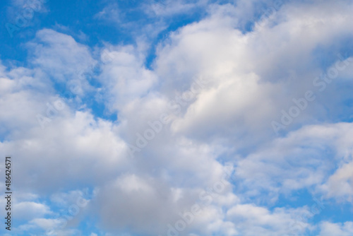 Close up shot of a blue sky with white clouds