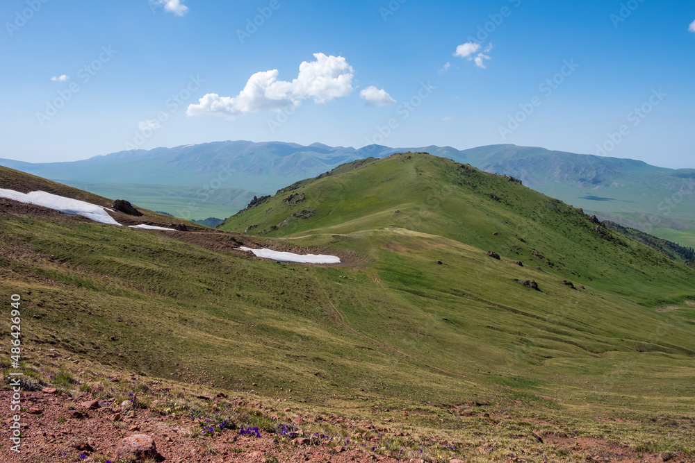 Kyzyl-auz mountain pass connecting Assy plateau and Zhenishke river valley. Tourism, travel in Kazakhstan concept. Spring season. Nature background. Kyzyl-auz mountain pass connecting Assy plateau and Zhenishke river valley. Tourism, travel in Kazakhstan concept. Spring season. Nature background.