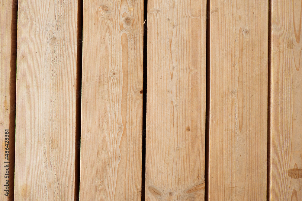 Fototapeta premium Old painted wood wall. Brown abstract background. Vintage wooden dark vertical boards. Front view with copy space.