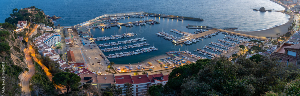 Aerial views of the city of Blanes on the Costa Brava of Gerona Maresme Barcelona European tourist town sunset beach