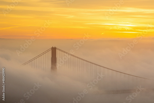 Golden Gate Bridge with low fog in USA
