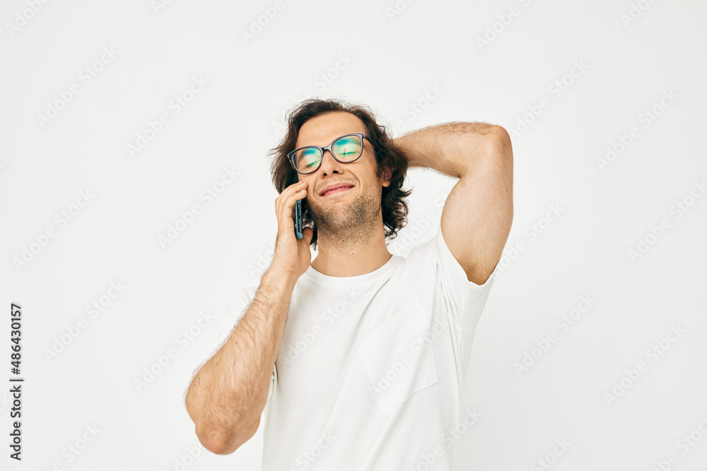 handsome man talking on the phone technologies Lifestyle unaltered handsome man talking on the phone technologies Lifestyle unaltered