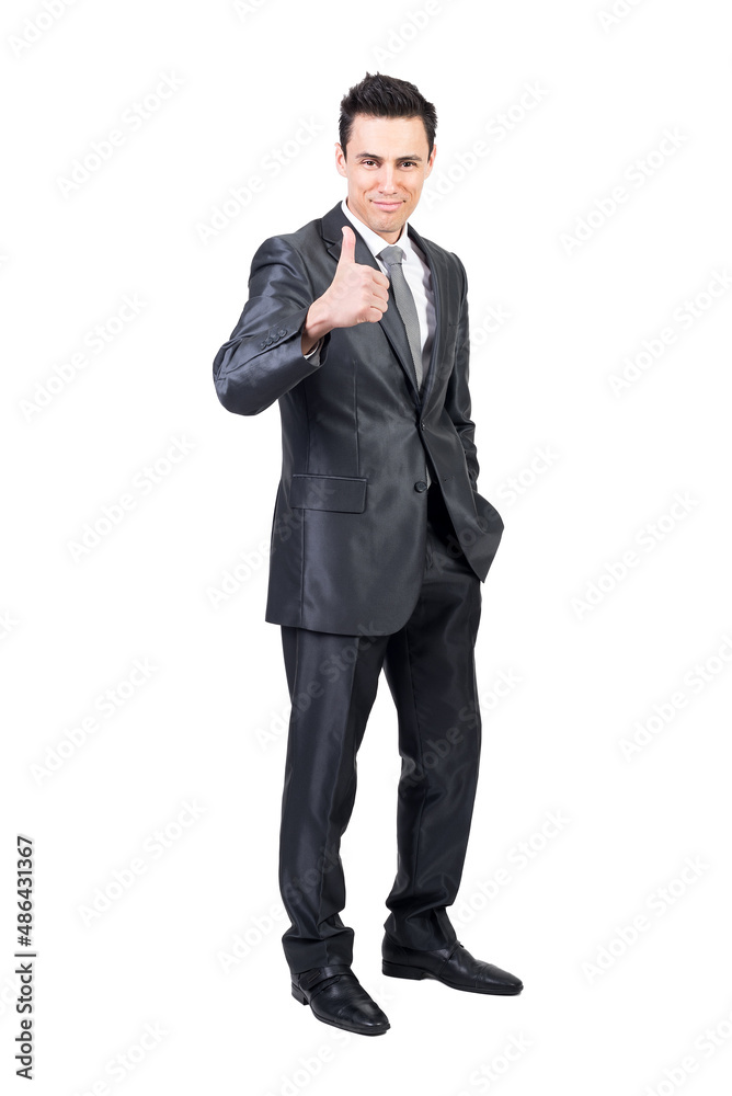 Businessman showing like gesture in studio. White background.