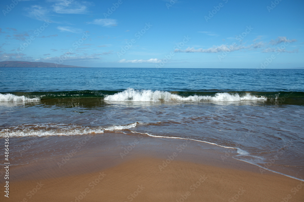 Beach and tropical sea background. Concept of summer relaxation. Surf splashing tide.
