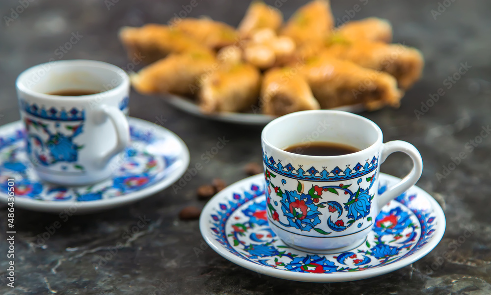 Turkish baklava and coffee on the table. Selective focus. Turkish baklava and coffee on the table. Selective focus.