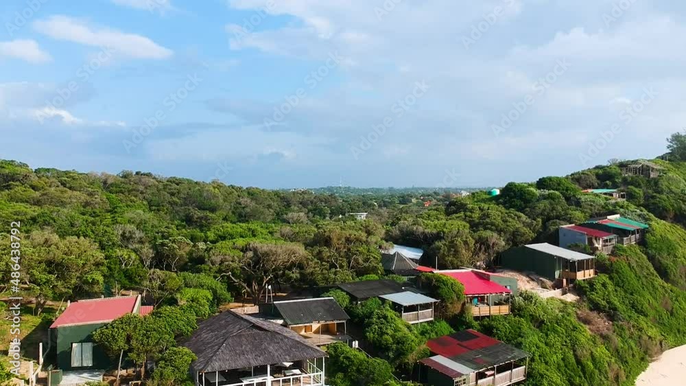 Beach town reveal shot, coastal tropical paradise Beach town reveal shot, coastal tropical paradise