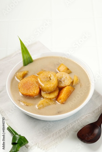 Kolak Pisang Ubi is Banana Sweet Potato Compote. Popular Indonesian Dessert Made from Coconut milk, Palm Sugar and Pandanus Leaves.