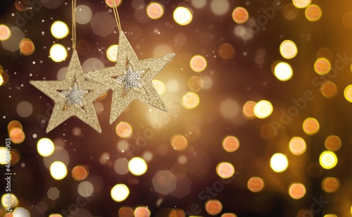 Christmas warm gold garland lights over dark background for glitter overlay