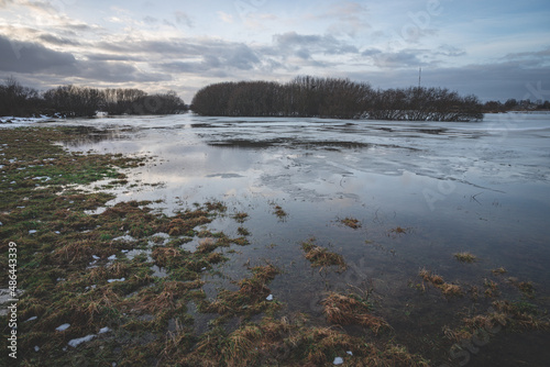 spring floods in meadows of river Lielupe, Latvia, Jelgava, water covered field in March