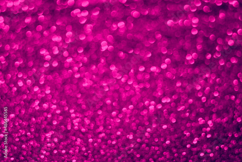 Magenta glitter shiny background. Pink sparkles texture.