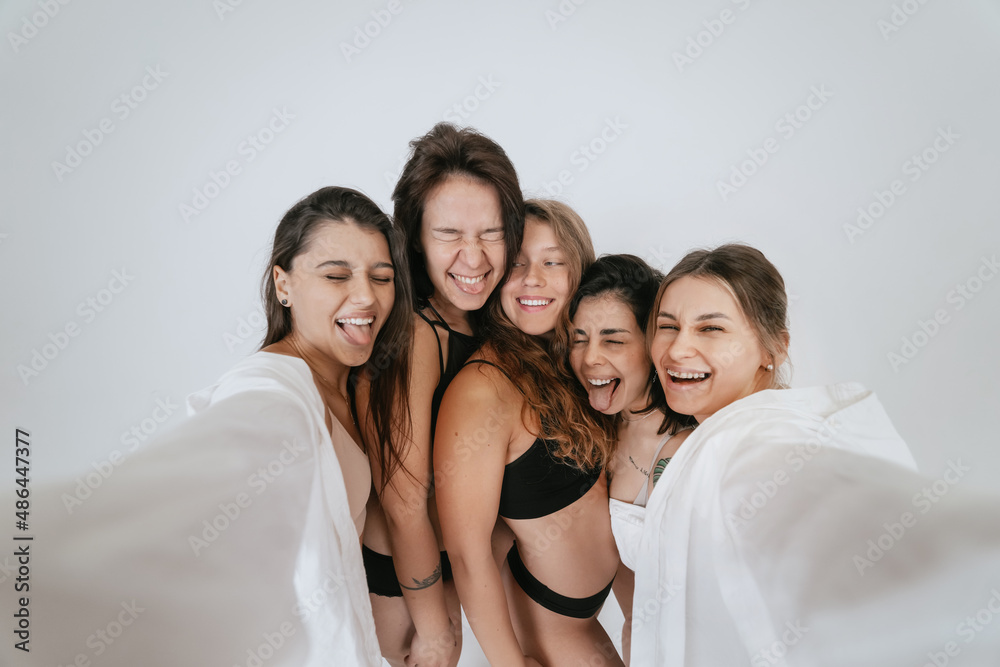 Fototapeta premium Diverse models wearing comfortable underwear take selfie