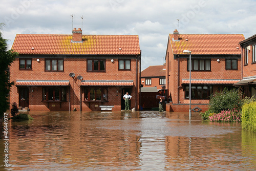 flooded homes and street, flash flooding   photo