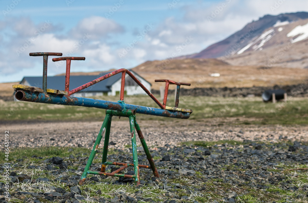 rusty seesaw in no man's land