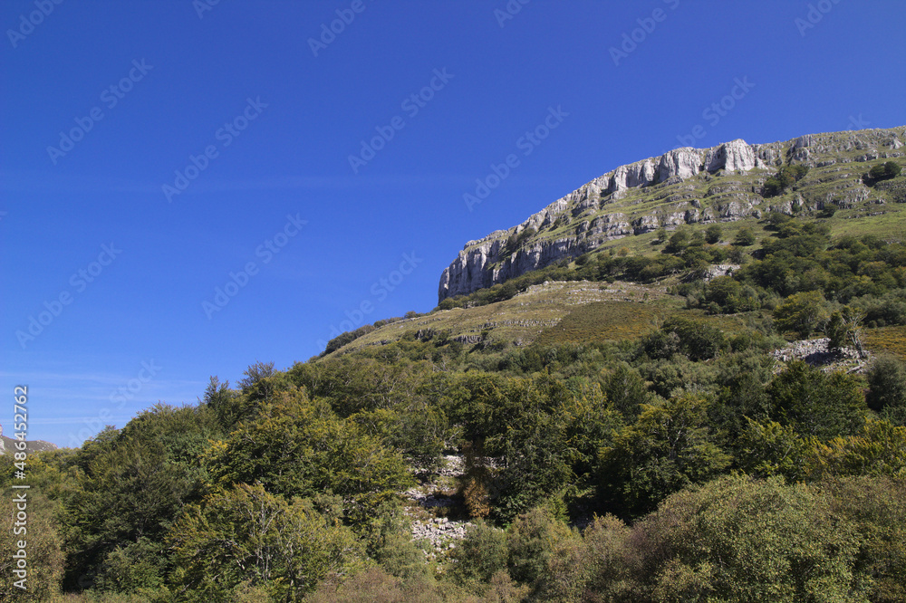 Mountainous part of Cantabria in the north of Spain, hiking route in Collados del Ason Natural Park Mountainous part of Cantabria in the north of Spain, hiking route in Collados del Ason Natural Park