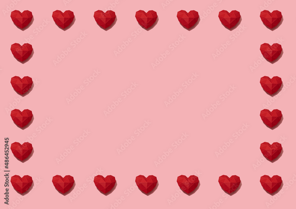 Red paper hearts frame pattern on pink background