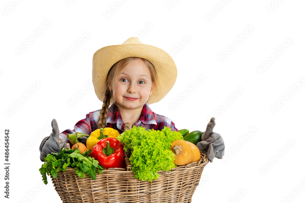 Portrait of cute little girl, emotive kid in image of farmer, gardener with large basket of vegetables isolated on white background. Concept of job, work, childhood, games