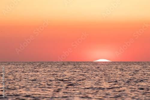 sun rising at dawn over the mediterranean sea on the costa brava