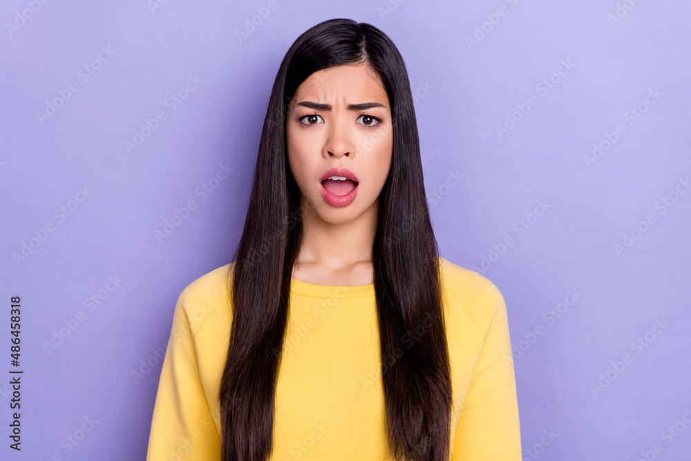 Portrait of impressed negative mood grumpy face girl hear band news information isolated on purple color background Portrait of impressed negative mood grumpy face girl hear band news information isolated on purple color background