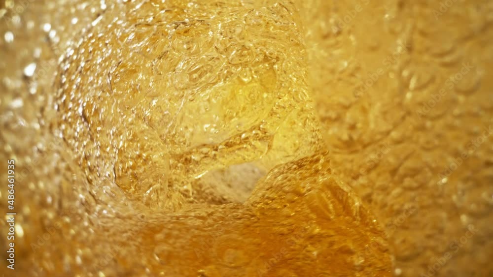 Super slow motion of pouring beer in twister shape. Filmed on high speed cinema camera 1000 fps. Ultimate inside bottle view filmed with special wide angle macro lens.