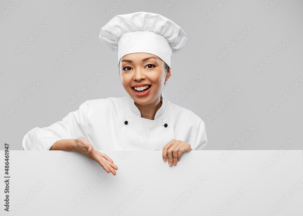cooking, advertisement and people concept - happy smiling female chef with white board over grey background cooking, advertisement and people concept - happy smiling female chef with white board over grey background