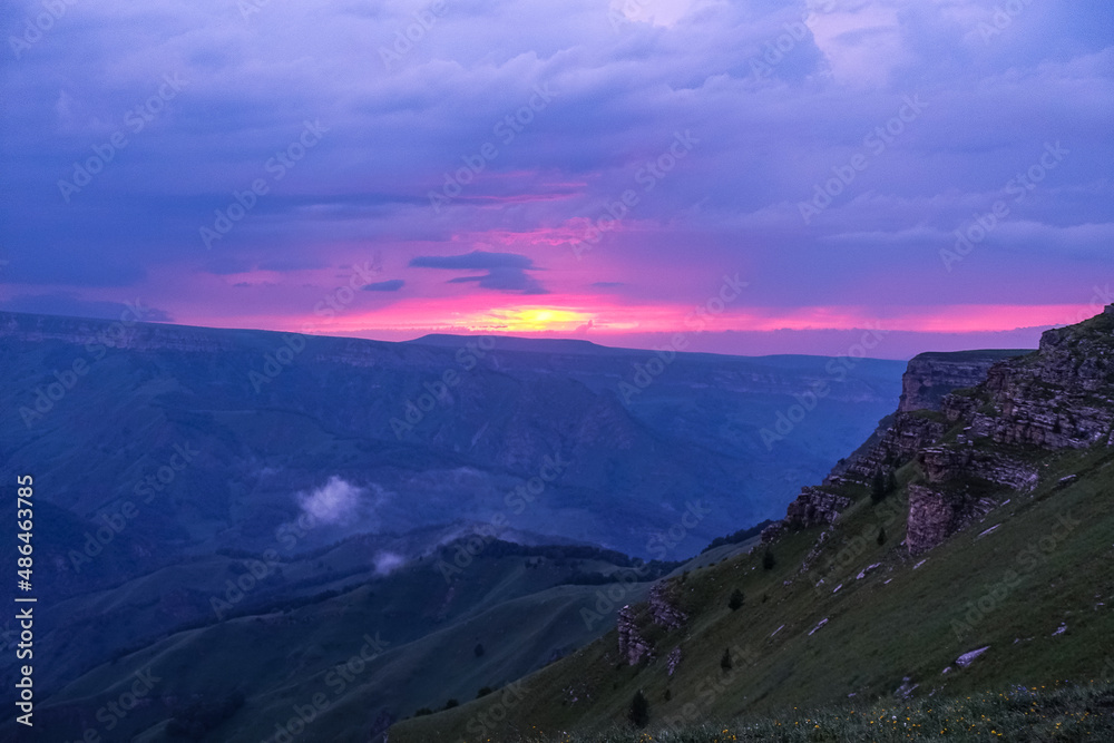 Fototapeta premium Sunset on the Bermamyt plateau in the Karachay-Cherkess Republic, Russia. Elbrus.