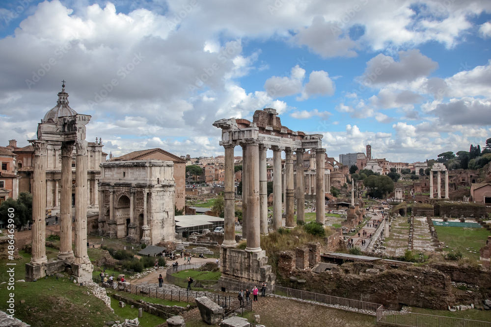 View from the Capitol to the Imperial Forums, the ruins of the Basilica of Julius and the temple of Saturn and the arch of Septimius Severus. Rome, Italy