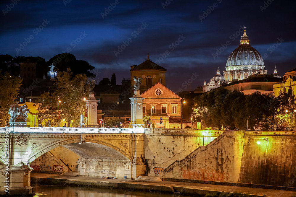 View of the Victor Emmanuel bridge and St. Peter's Cathedral in the evening. Rome, Lazio, Italy