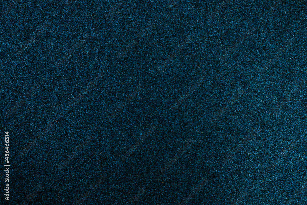 Dark blue glitter cardboard texture. Navy blue color texture with light Dark blue glitter cardboard texture. Navy blue color texture with light