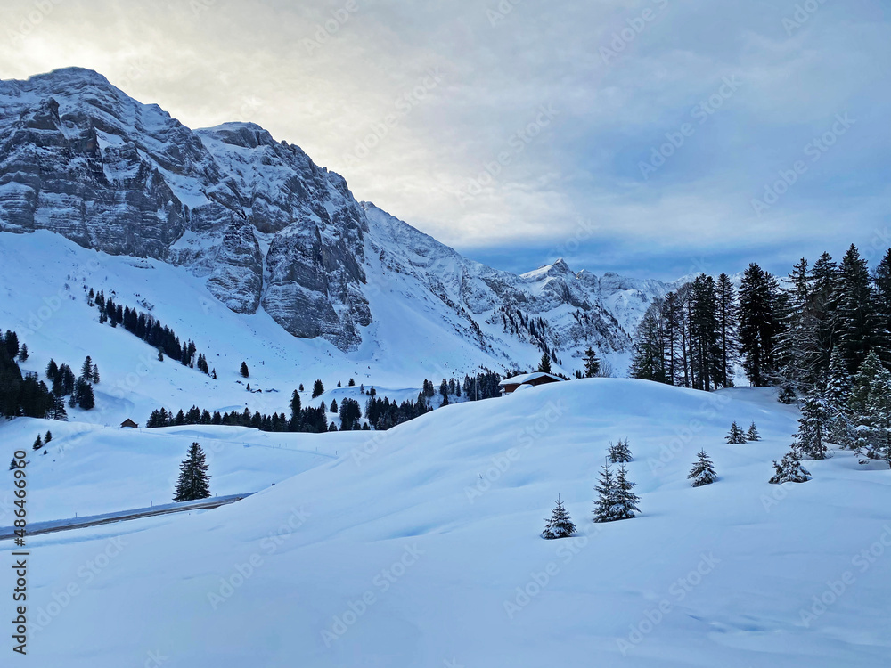 Winter ambience and beautiful idyllic atmosphere on the snow-capped Alpine mountain Alpstein in the Appenzell Alps massif - Switzerland (Schweiz)