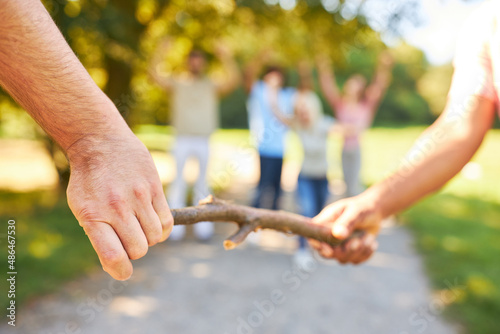 Hands pass baton in the relay race