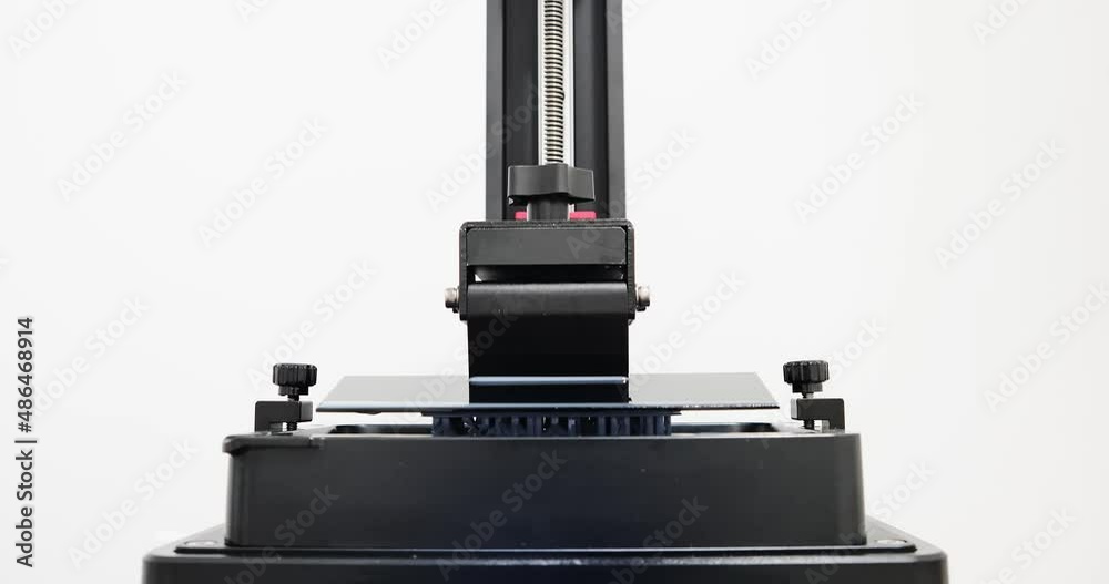 Msla Time lapse of 3D printer printing theword 3D Printing form liquid resin ...