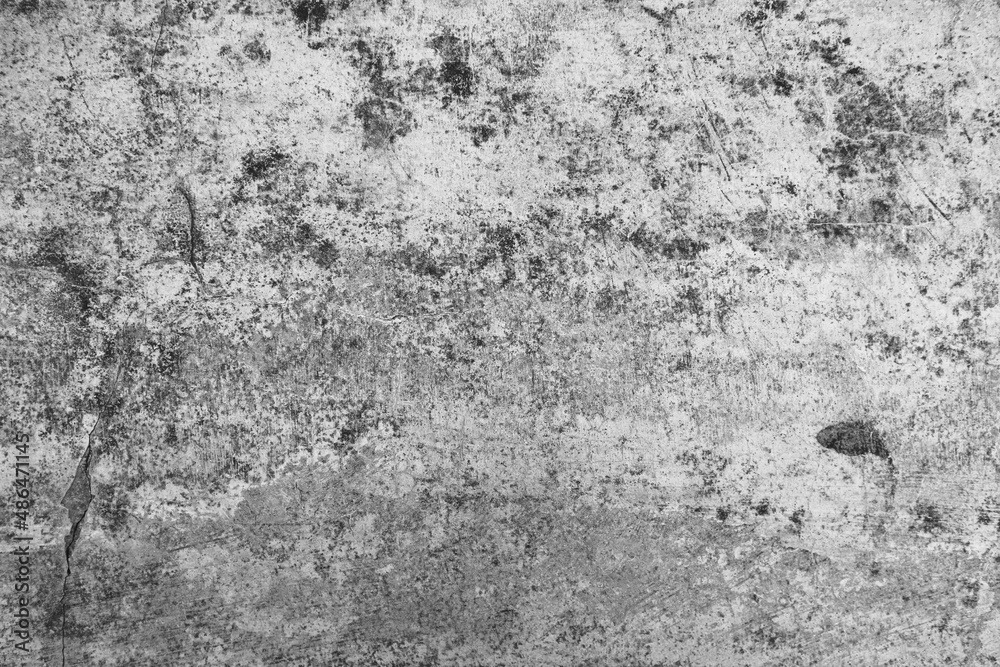 Fototapeta premium Old grunge dirty textured cement wall surface. With uneven stains and tiny holes.